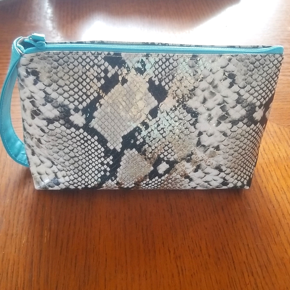 Travel Makeup Bag With Luxury Name Brand Cosmetics And Toiletries